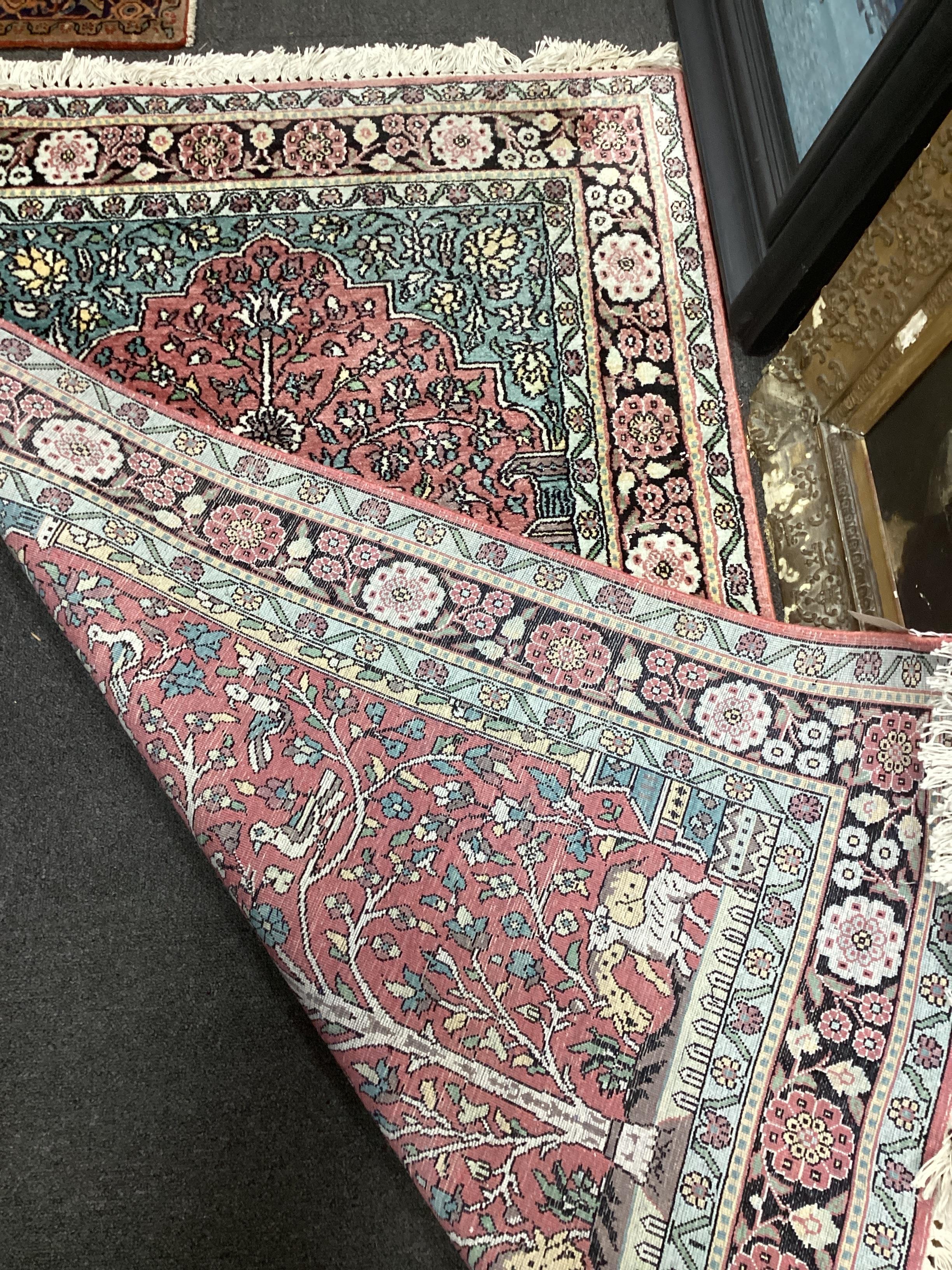 A North West Persian red ground 'tree of life' rug, 154 x 95cm